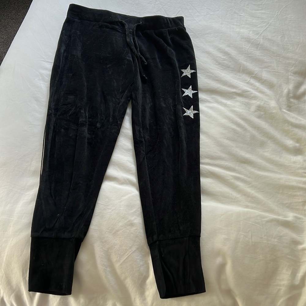 Black velvet joggers with silver stars